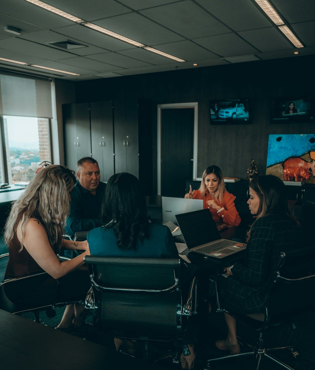 group of programmers in meeting